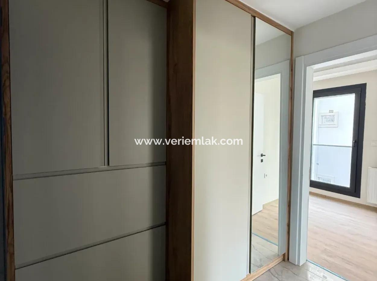 Neue 11-Wohnung Zum Verkauf Mit Offener Fassade, Grossem Balkon Und Garderobe In Seferihisar Camike