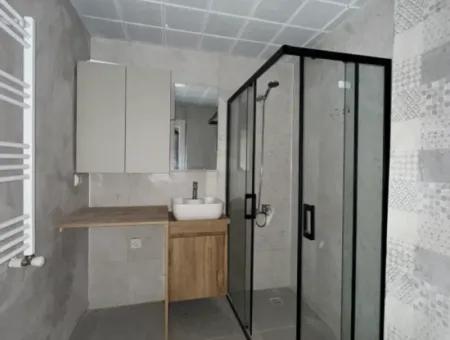 Neue 11-Wohnung Zum Verkauf Mit Offener Fassade, Grossem Balkon Und Garderobe In Seferihisar Camike