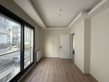 Neue 11-Wohnung Zum Verkauf Mit Offener Fassade, Grossem Balkon Und Garderobe In Seferihisar Camike