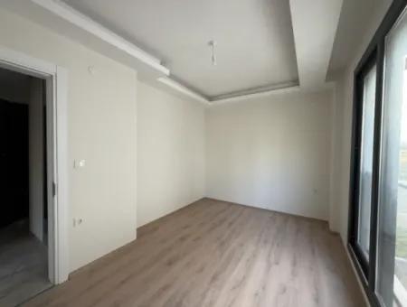 Neue 11-Wohnung Zum Verkauf Mit Offener Fassade, Grossem Balkon Und Garderobe In Seferihisar Camike