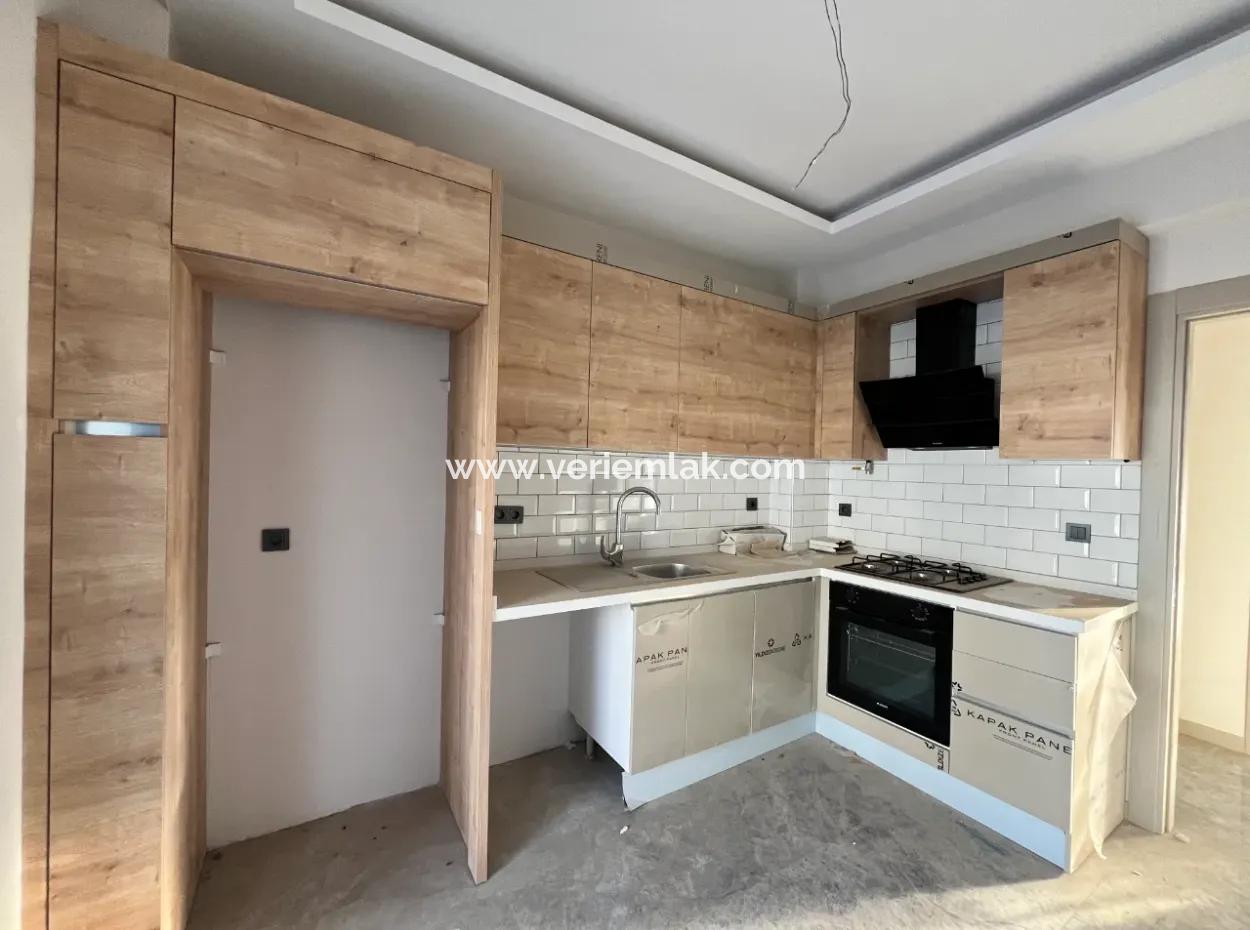 2 1 Brand New Apartment In Seferihisar With Separate Kitchen, Balcony And 3 Built-In Sets!