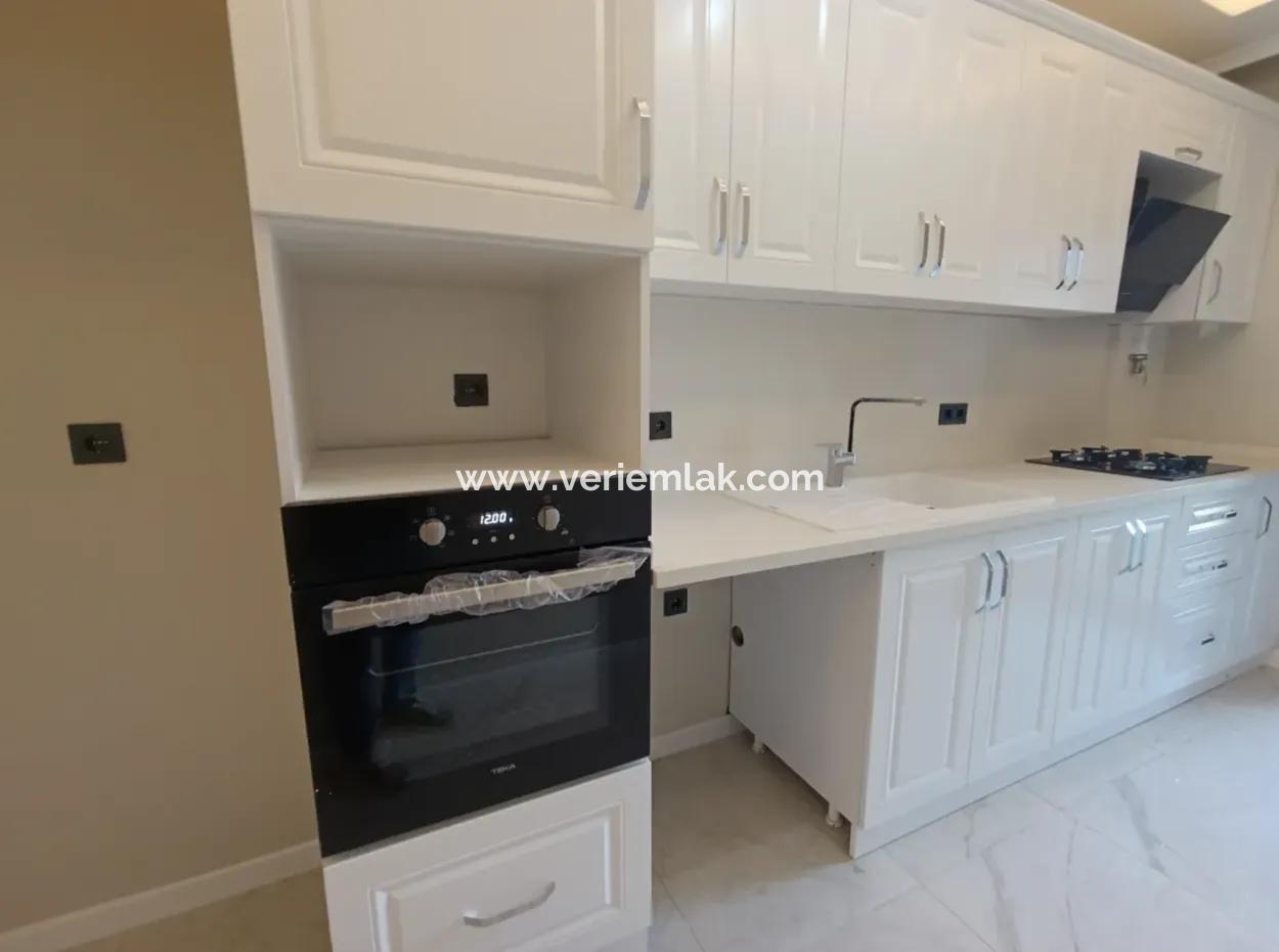 2 1 Brand New Apartment With Separate Kitchen In A Complex With Garden, Pool And Security In Seferihisar Camikebir Neighborhood!