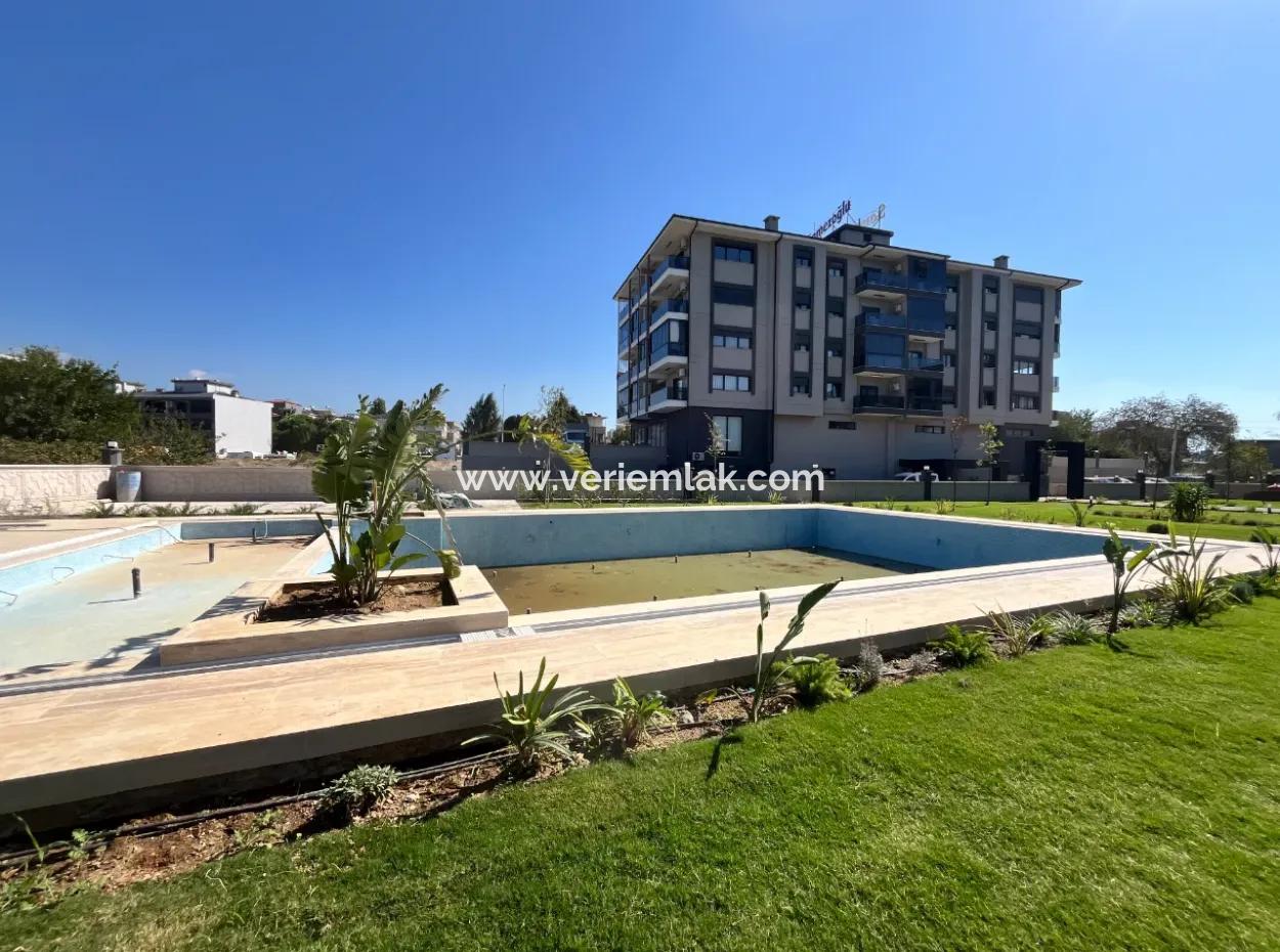 Brand New 3 1 Apartment In A Complex With Pool In Seferihisar | 140 M² | En-Suite Bathroom | Separate Kitchen | Terrace With View | Large Landscaping Areas | Spacious Living