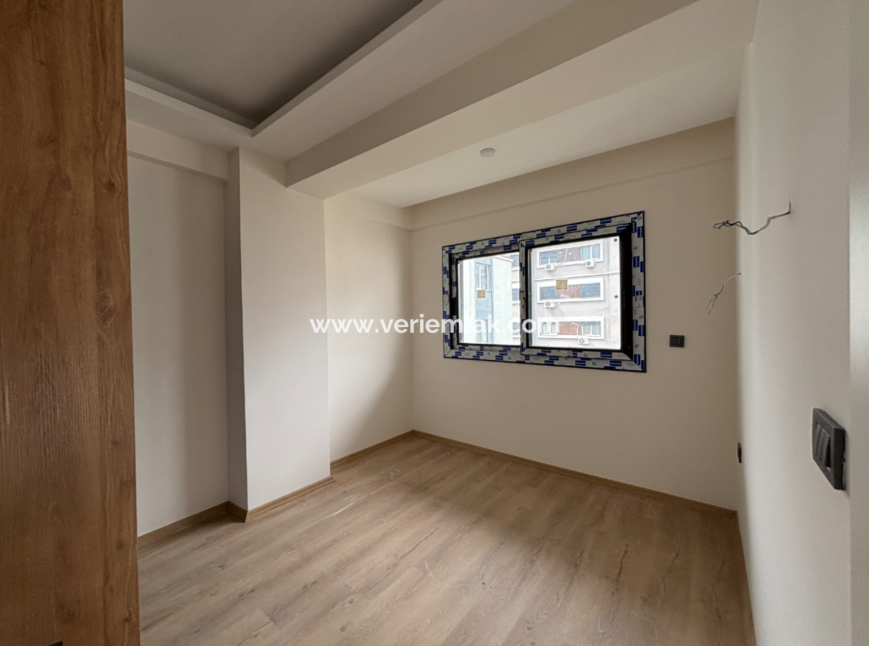 2 1 Apartment With Large Balcony For Sale Near The Main Street In Seferihisar Camikebir Neighborhood