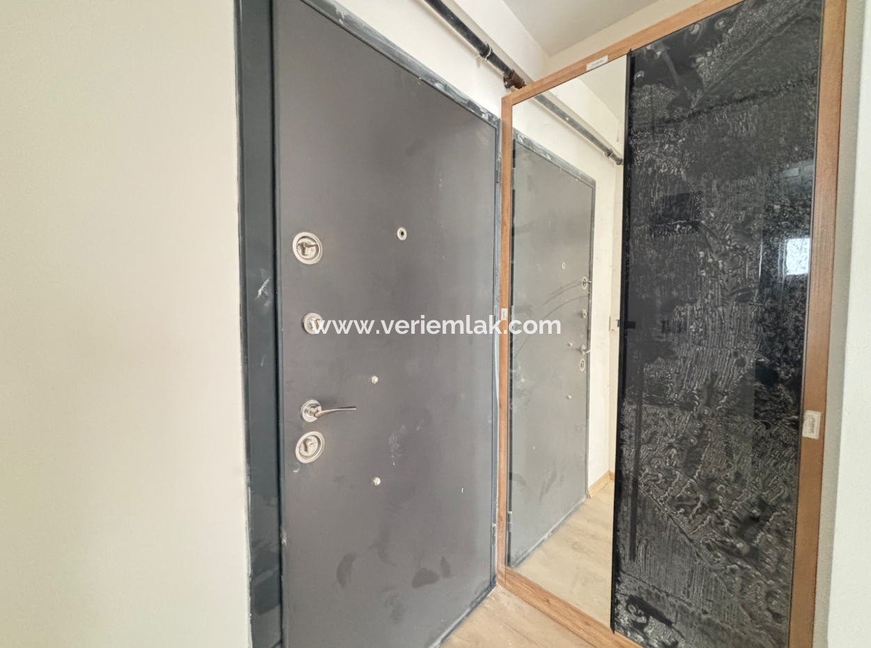 2 1 Apartment With Large Balcony For Sale Near The Main Street In Seferihisar Camikebir Neighborhood