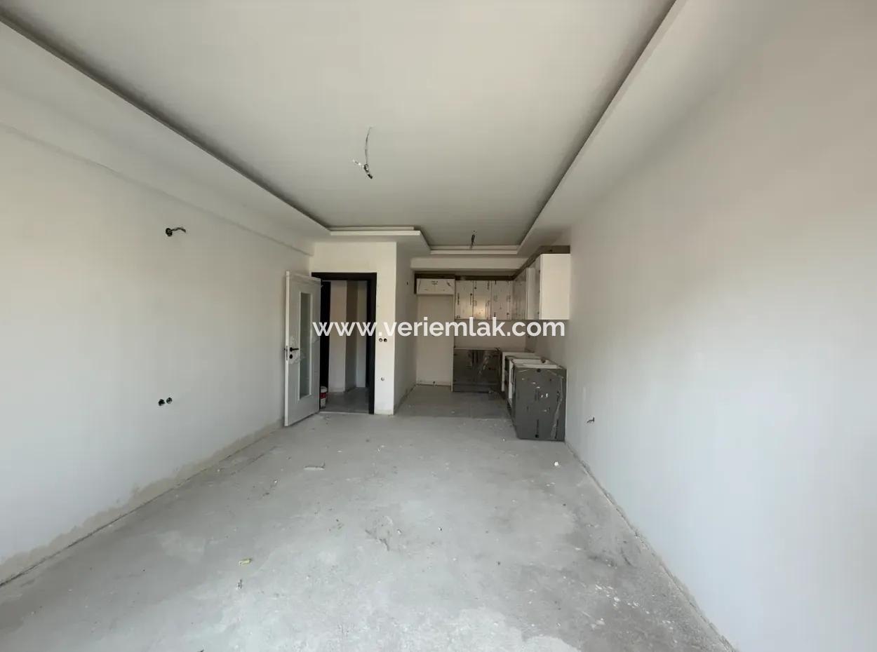 New 2 1 Apartment For Sale Near Seferihisar State Hospital, With A Wide Usage Area