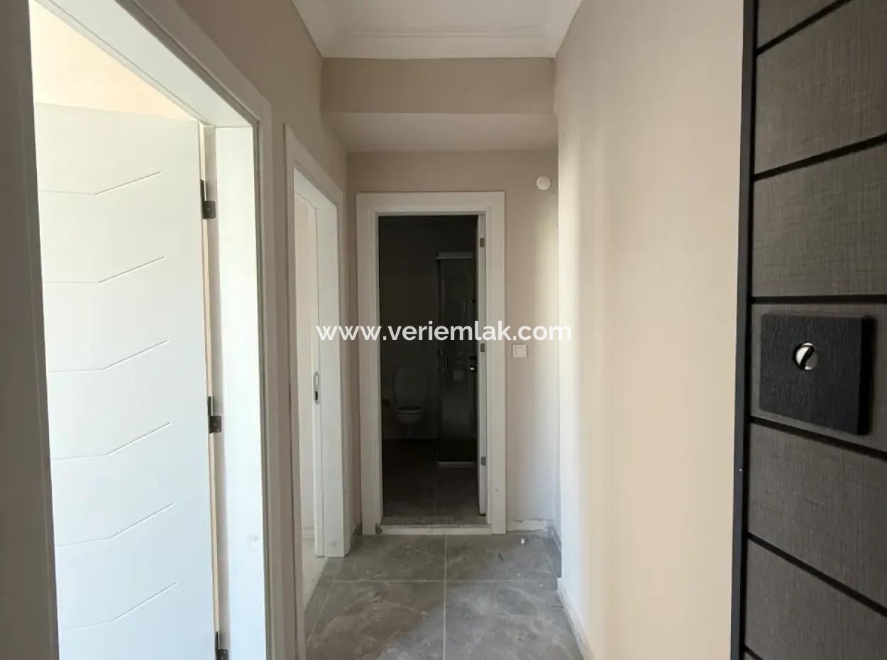 Near Seferihisar State Hospital, New, 1 1 Flat For Sale – With Indoor Parking, Balcony And Central Location