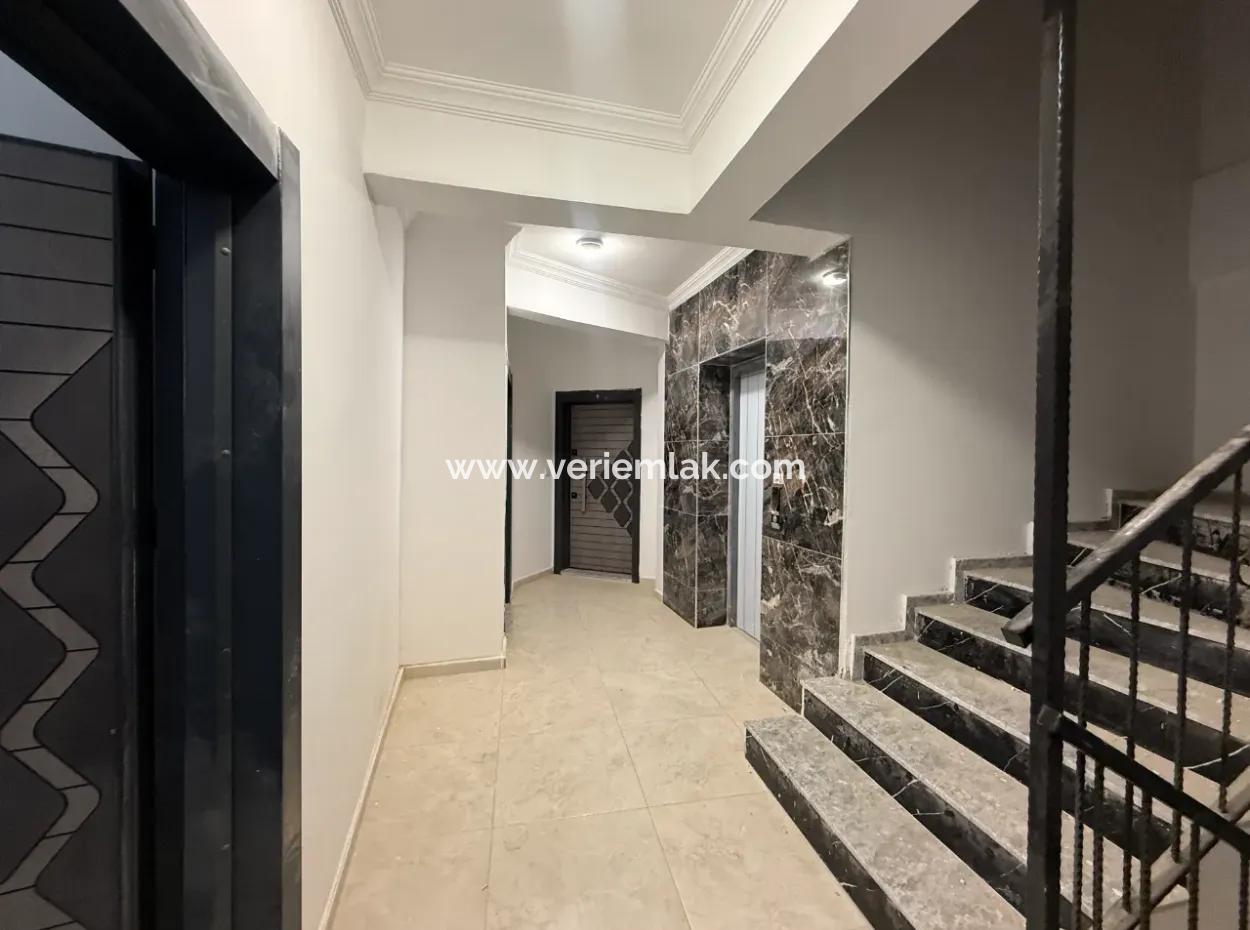 Near Seferihisar State Hospital, New, 1 1 Flat For Sale – With Indoor Parking, Balcony And Central Location