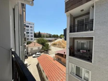 Near Seferihisar State Hospital, New, 1 1 Flat For Sale – With Indoor Parking, Balcony And Central Location