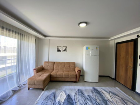 Seferihisar Camikebir Mahallesi Gözsüzler Caddesi'nde Havuzlu Site İçerisinde Eşyalı Kiralık 1+1 Daire