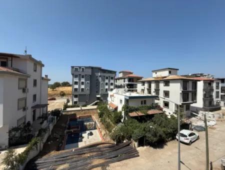 Seferihisar Camikebir Mahallesi'nde Satılık Sıfır 2+1 Daire | Balkonlu | Otomatik Panjurlu | Arçelik Ankastreli | Otoparklı